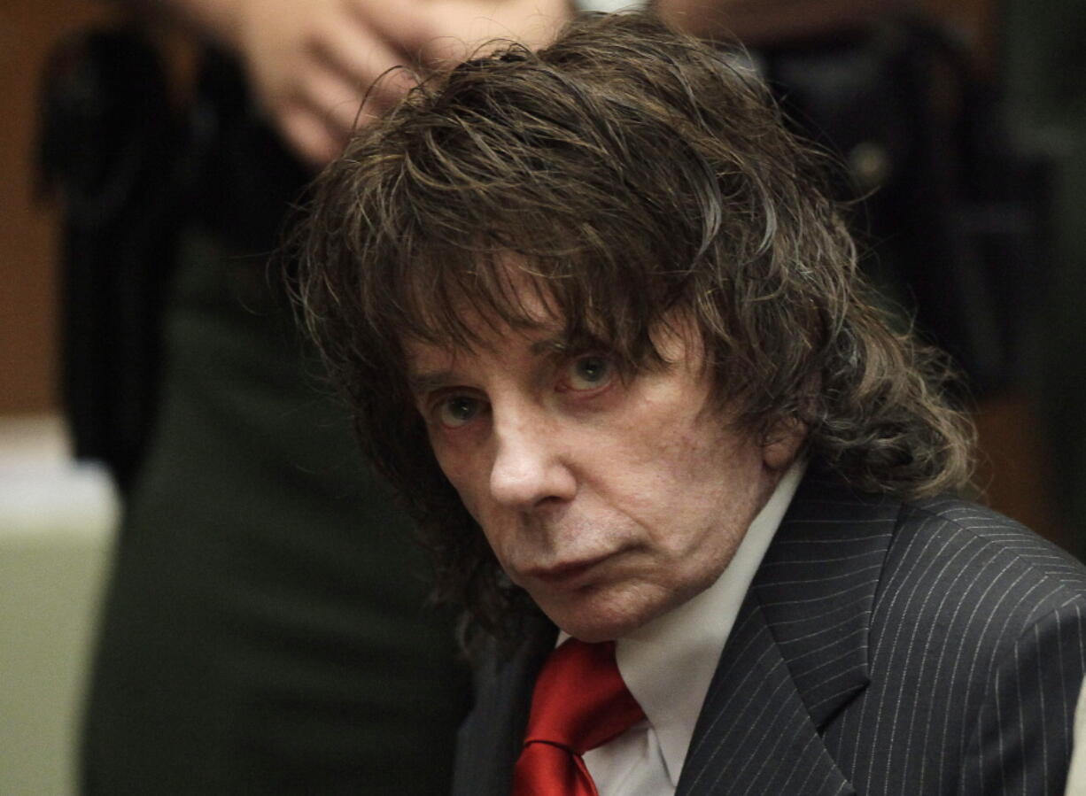 FILE - In this May 29, 2009 file photo, music producer Phil Spector sits in a courtroom for his sentencing in Los Angeles. Spector, the eccentric and revolutionary music producer who transformed rock music with his &quot;Wall of Sound&quot; method and who was later convicted of murder, died Saturday, Jan. 16, 2021, at age 81.  (AP Photo/Jae C.