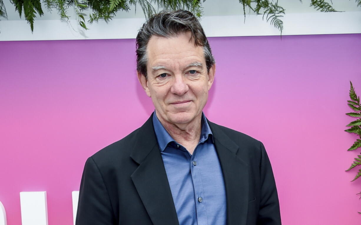 FILE - Lawrence Wright attends the Hulu 2017 Upfront Presentation on May 3, 2017, in New York. One of the first book-length inside accounts of the worldwide spread of COVID-19 will be coming out in June. Wright&#039;s &quot;The Plague Year,&quot; which builds on a New Yorker story that ran earlier this month, will be published June 8.