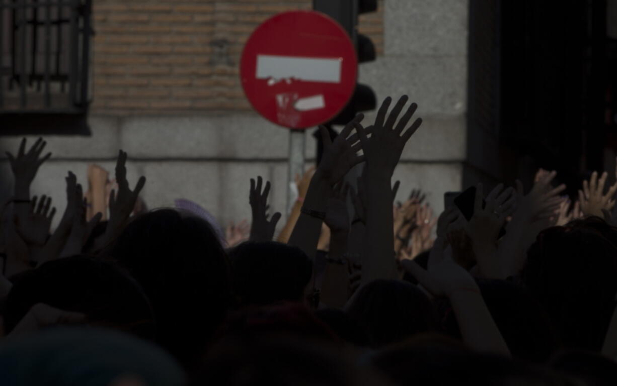 Protesters demonstrate June 22, 2018, while blocking the street outside the Justice Ministry in Madrid, Spain. The first comprehensive internal inquiry on sex abuse allegations by a religious order in Spain has identified 81 children and 37 adult victims by 96 Jesuits since the late 1920s, in a report released Friday.