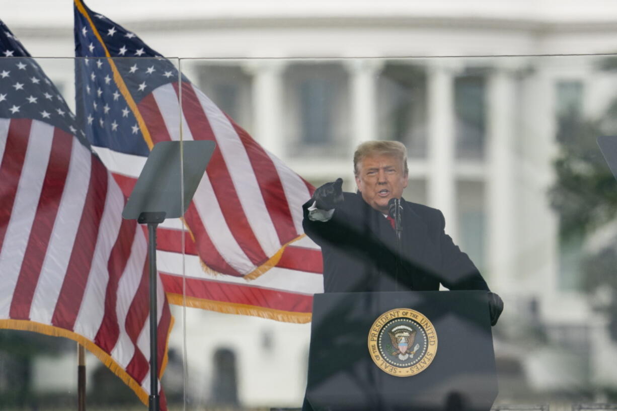 President Donald Trump speaks during a rally protesting the electoral college certification of Joe Biden as President, Wednesday, Jan. 6, 2021, in Washington.