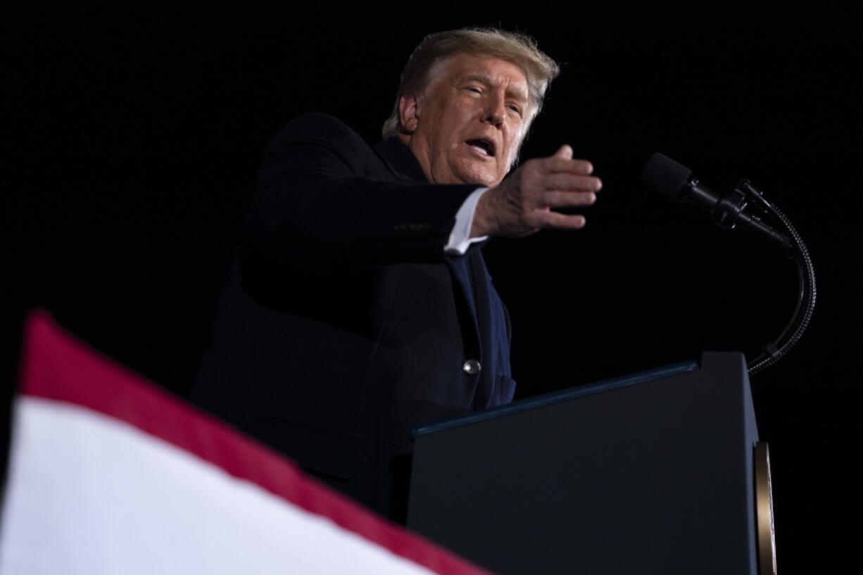 President Donald Trump speaks during a campaign rally for Sen. Kelly Loeffler, R-Ga., and David Perdue, at Dalton Regional Airport, Monday, Jan. 4, 2021, in Dalton, Ga.