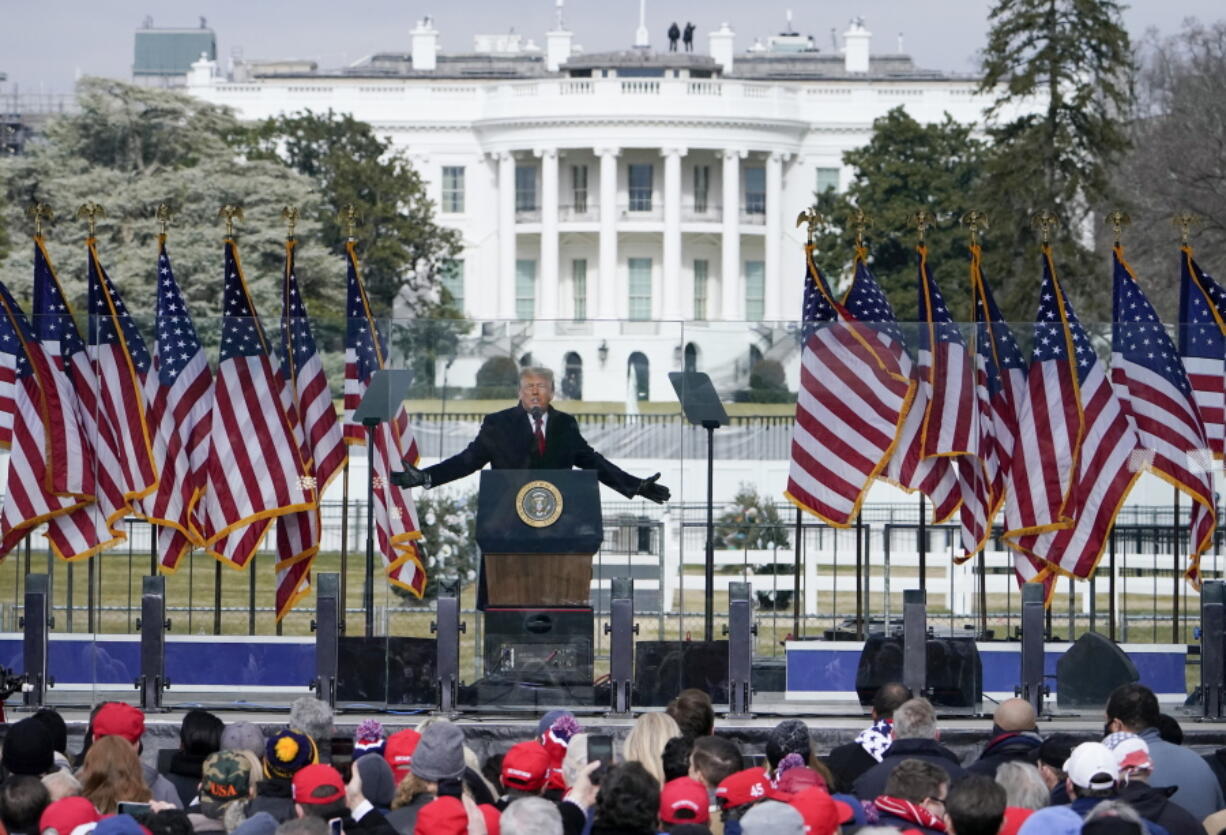 FILE - In this Jan. 6, 2021, file photo with the White House in the background, President Donald Trump speaks at a rally in Washington.