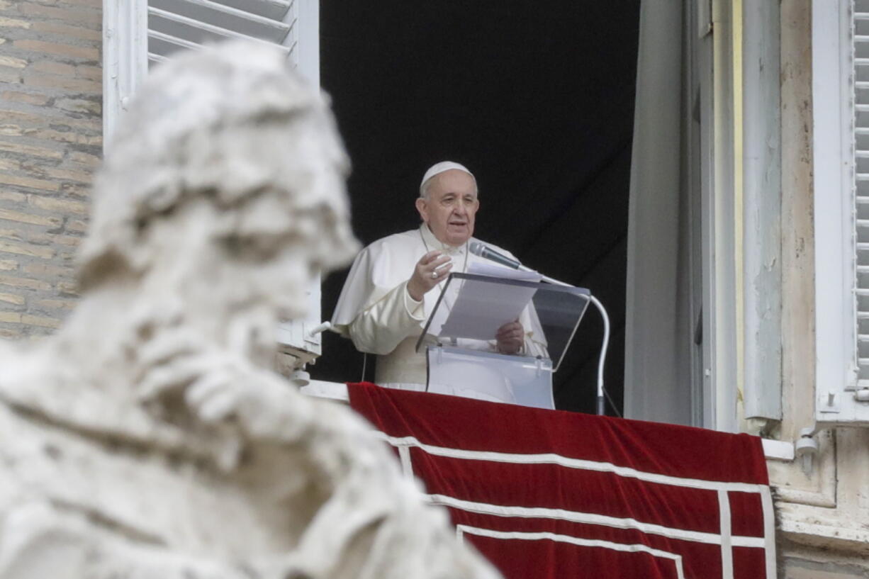 FILE - In this Dec. 8, 2020 file photo, Pope Francis delivers his message during the Angelus noon prayer from the window of his studio overlooking St.Peter&#039;s Square, on the Immaculate Conception day, at the Vatican. Pope Francis is once again canceling public appearances due to nerve pain. Francis will not participate in three events over the coming days &quot;due to a recurrence of sciatica,&quot; Vatican spokesman Matteo Bruni said in a statement on Saturday, Jan. 23, 2021.