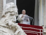 FILE - In this Dec. 8, 2020 file photo, Pope Francis delivers his message during the Angelus noon prayer from the window of his studio overlooking St.Peter&#039;s Square, on the Immaculate Conception day, at the Vatican. Pope Francis is once again canceling public appearances due to nerve pain. Francis will not participate in three events over the coming days &quot;due to a recurrence of sciatica,&quot; Vatican spokesman Matteo Bruni said in a statement on Saturday, Jan. 23, 2021.