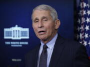 In this Jan. 21, 2021, photo, Dr. Anthony Fauci, director of the National Institute of Allergy and Infectious Diseases, speaks with reporters in the James Brady Press Briefing Room at the White House in Washington. President Joe Biden is dispatching the nation&#039;s top scientists and public health experts to regularly brief the American public about the pandemic. Beginning Jan. 27, the experts will host briefings three times a week on the state of the outbreak and efforts to control it.