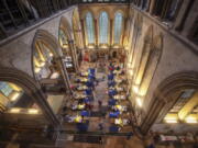 Cubicles erected inside Salisbury Cathedral, for people to receive a dose of the Pfizer-BioNTech coronavirus vaccine, in Salisbury, England, Saturday, Jan. 16, 2021.  Vaccination centers are being opened in England at some of the country&#039;s great cathedrals. Salisbury Cathedral, which also houses a copy of the Magna Carta, opened its great nave to the public. Others will follow as the rollout continues. Organ music played as the jabs were delivered at Salisbury and requests were even taken.