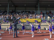 Heritage&#039;s student section and cheer team support their team during the 2019 season opener at McKenzie Stadium. Attendance at games in 2021 will be extremely limited due to health guidelines.