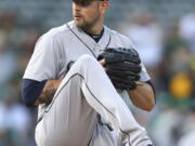 James Paxton, pitching here for the Mariners in 2018, has been brought back to Seattle on a one-year deal worth $8.5 million.