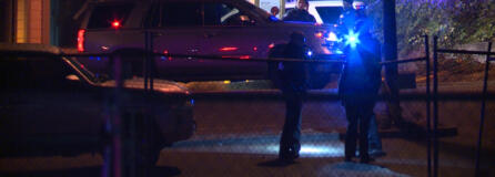 Law enforcement officials from multiple agencies converge at the parking lot of a Hazel Dell US Bank branch on Oct.