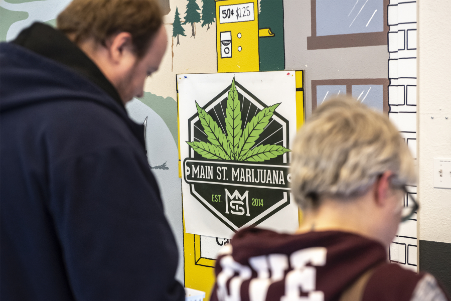 A poster for Main Street Marijuana is seen here on the dispensaryis wall in Vancouver on Tuesday afternoon, Feb. 4, 2020.