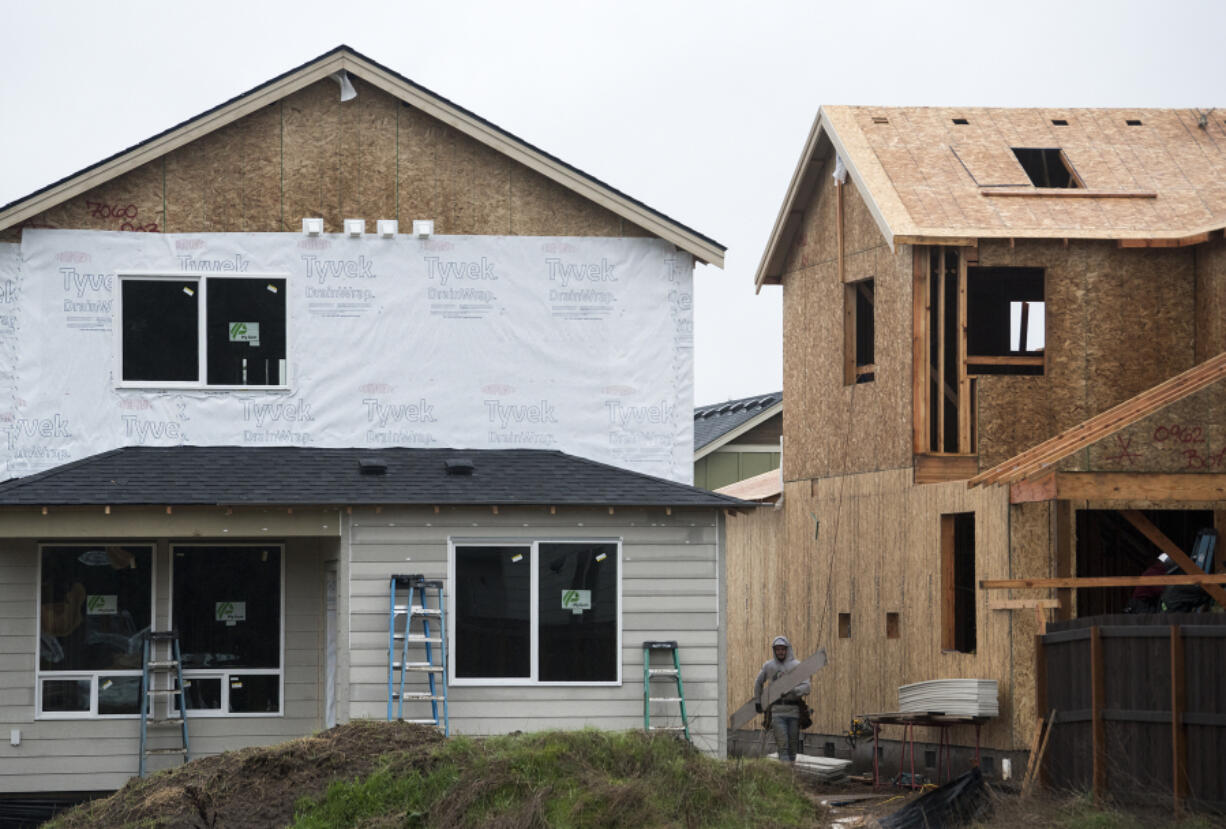 New homes under construction in the Parkers Abby development in Vancouver in January. Clark County's housing market is experiencing record high demand, with bidding wars on virtually every listed property.