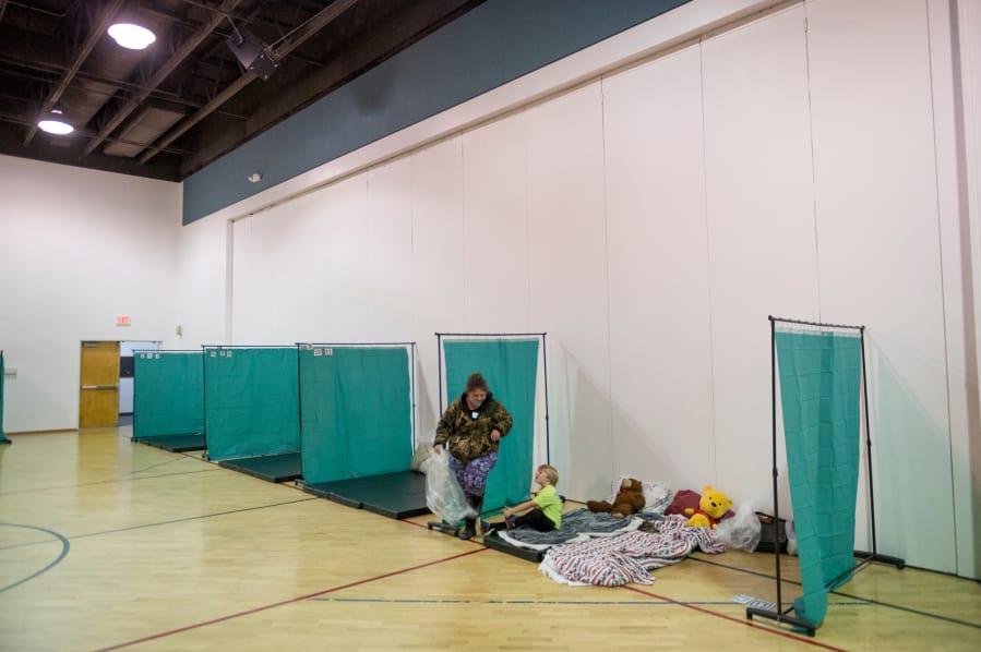Homeless shelters in Clark County will expand to help the homeless as a winter storm approaches — despite the pandemic.