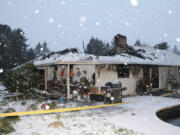 A Feb. 11 house fire, in which the home&#039;s roof collapsed, was caused by an electrical malfunction or failure of the microwave range, according to the Vancouver Fire Marshal&#039;s Office.