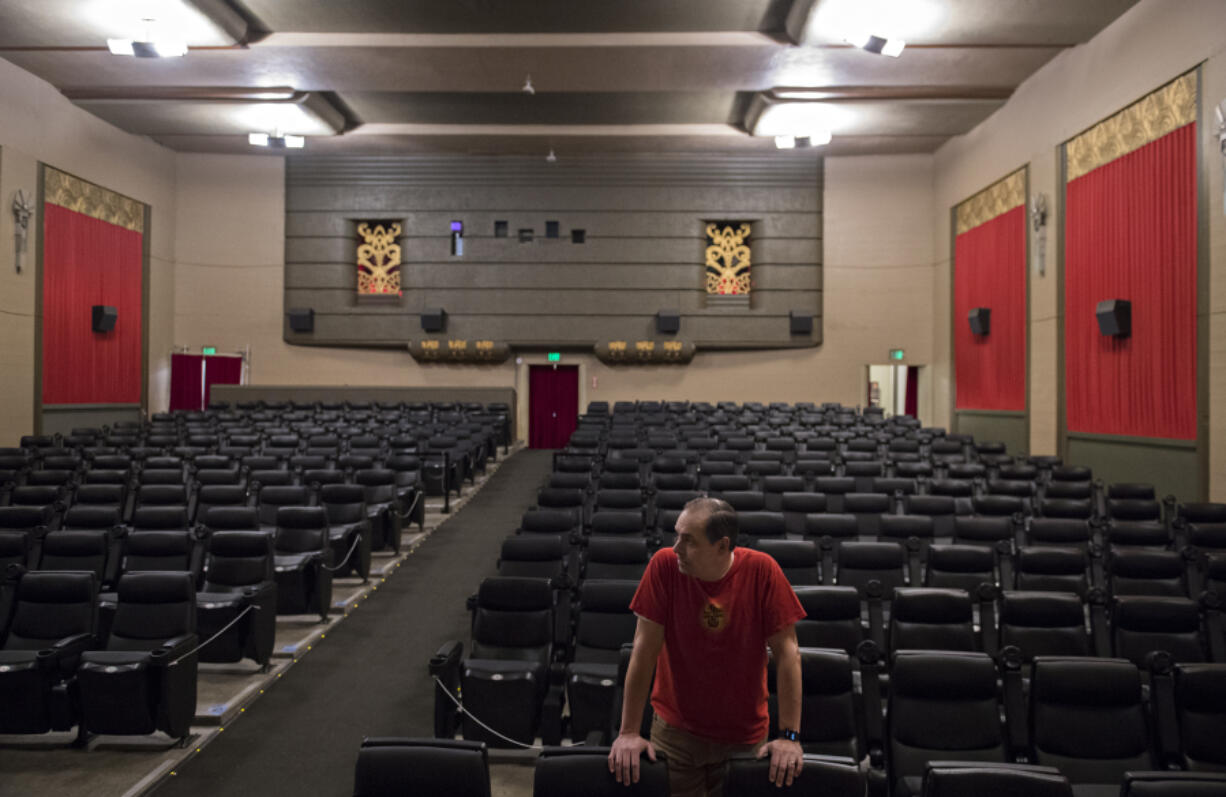 Dan Wyatt, owner of Kiggins Theatre, pauses for a portrait in an empty auditorium on Wednesday. Wyatt is one of several local theater owners in Vancouver hoping for a chance to apply for a new federal relief program for entertainment and performing arts venues.