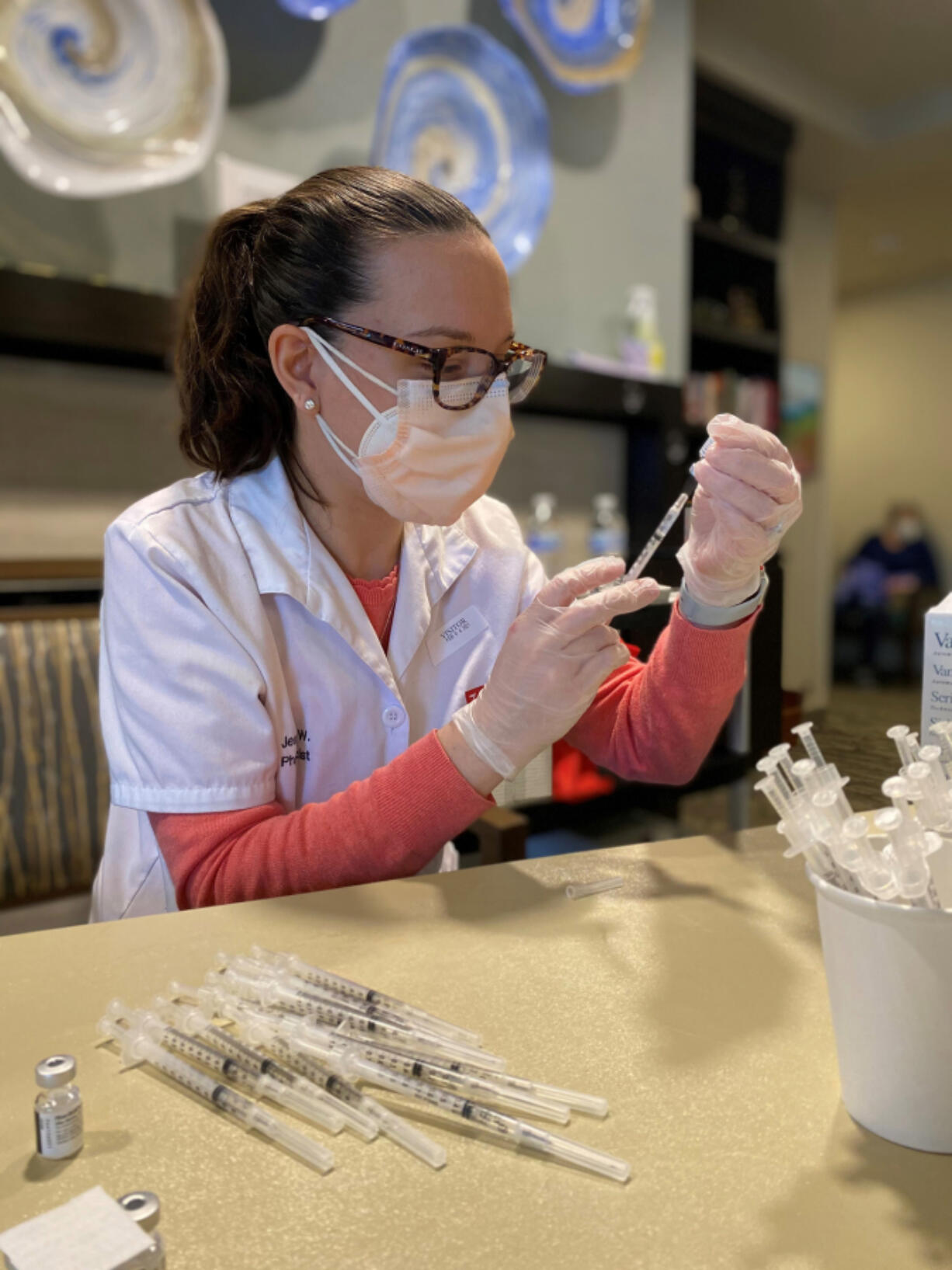 VAN MALL: Residents of Glenwood Place Senior Living recently held the second of three COVID-19 vaccination clinics, hosted by Walgreens Pharmacy on Feb.