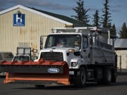 Crews from Clark County Public Works Department are gearing up for the possibility of severe winter weather, as seen Wednesday afternoon, Feb. 10, 2021.