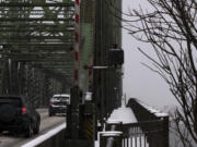 A snow-lined pedestrian walkway on the Interstate 5 bridge pictured on Friday afternoon, February 12, in downtown Vancouver.