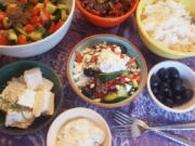 I used ground lamb for these Greek Haystacks, but lamb sausage or beef would work just as well. Lamb is expensive; I made it stretch by sauteeing it with peppers and onions.