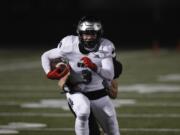 Union wide receiver Jake Bowen runs after a reception against Camas. Union vs. Camas on February 26, 2021.