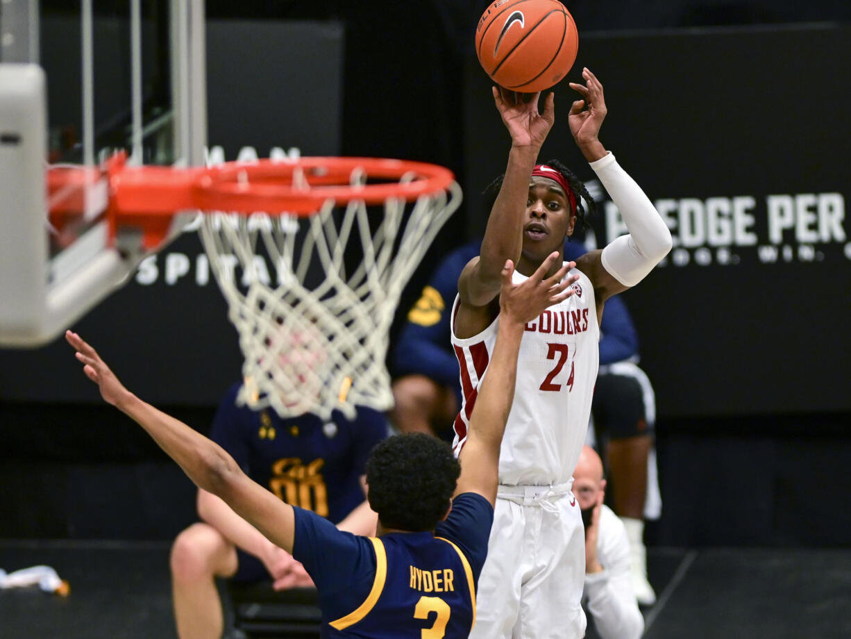 Washington State guard Noah Williams (24) attempts a 3-pointer as California guard Jarred Hyder (3) defends during the first half of an NCAA college basketball game Thursday, Feb. 18, 2021, in Pullman, Wash.