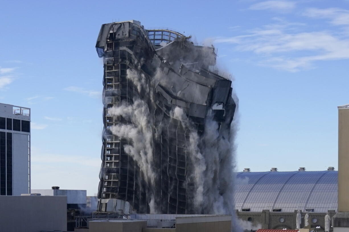 The former Trump Plaza casino is imploded on Wednesday, Feb. 17, 2021, in Atlantic City, N.J.