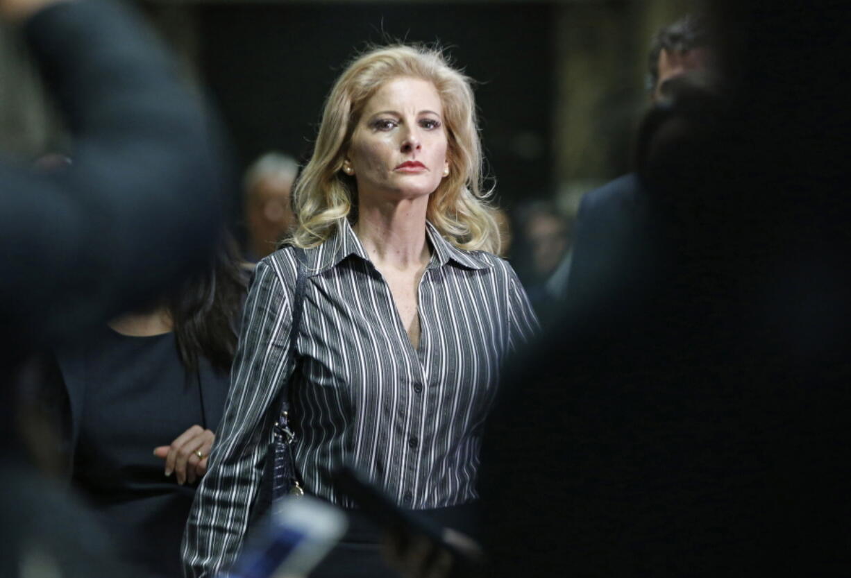 FILE - In this Dec. 5, 2017, file photo, Summer Zervos leaves Manhattan Supreme Court at the conclusion of a hearing in New York. The former &quot;Apprentice&quot; contestant is trying to get her defamation lawsuit against former President Donald Trump moving again now that he&#039;s no longer president.