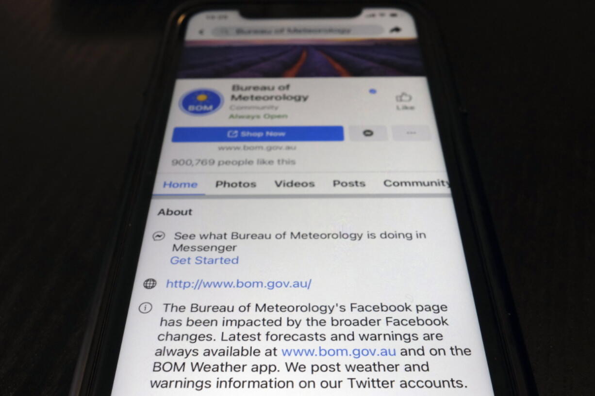 A disclaimer is shown on the bottom of Australia&#039;s Bureau of Meteorology page on the Facebook app Thursday, Feb. 18, 2021, in Tokyo. Australia&#039;s government has condemned Facebook over its shock move to prevent Australians sharing news that had also blocked some government communications. The Bureau of Meteorology&#039;s weather warnings, a Hobart women&#039;s shelter and the Betoota Advocate, a satirical website named after an Australian ghost town, were among those surprised to find their content blocked at least temporarily.