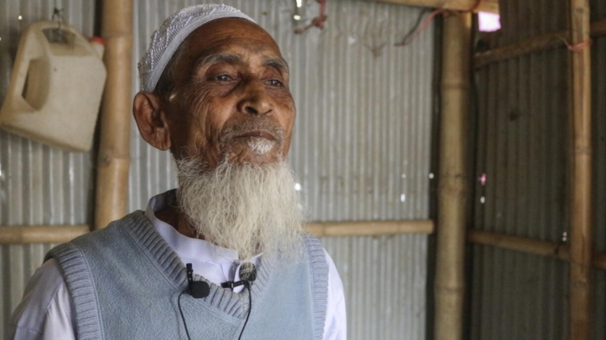 Rohingya refugee Mohammad Jaffar, 70, talks to the Associated Press at the Balukhali refugee camp in Cox&#039;s Bazar, Bangladesh, Tuesday, Feb.2, 2021. Rohingya refugees from Myanmar living in camps in Bangladesh are condemning the military coup in their homeland and saying it makes them more fearful to return. &quot;Repatriation will not be safe at all under this regime because the very people who are responsible for killing, torturing, raping, our mothers and sisters, have now come in power. After all this suffering we ran and came here.