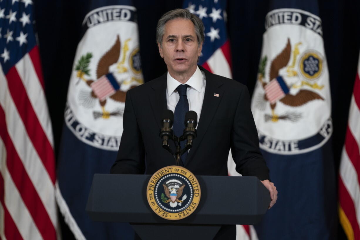 Secretary of State Antony Blinken introduces President Joe Biden for remarks to State Department staff, Thursday, Feb. 4, 2021, in Washington.