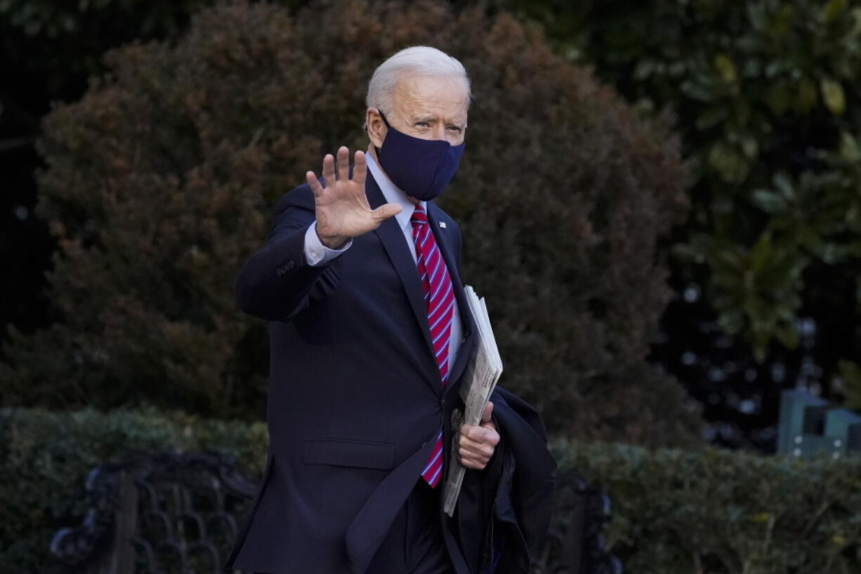 President Joe Biden waves as he walks to board Marine One on the South Lawn of the White House, Friday, Feb. 5, 2021, in Washington. (AP Photo/Alex Brandon) (Nam Y.