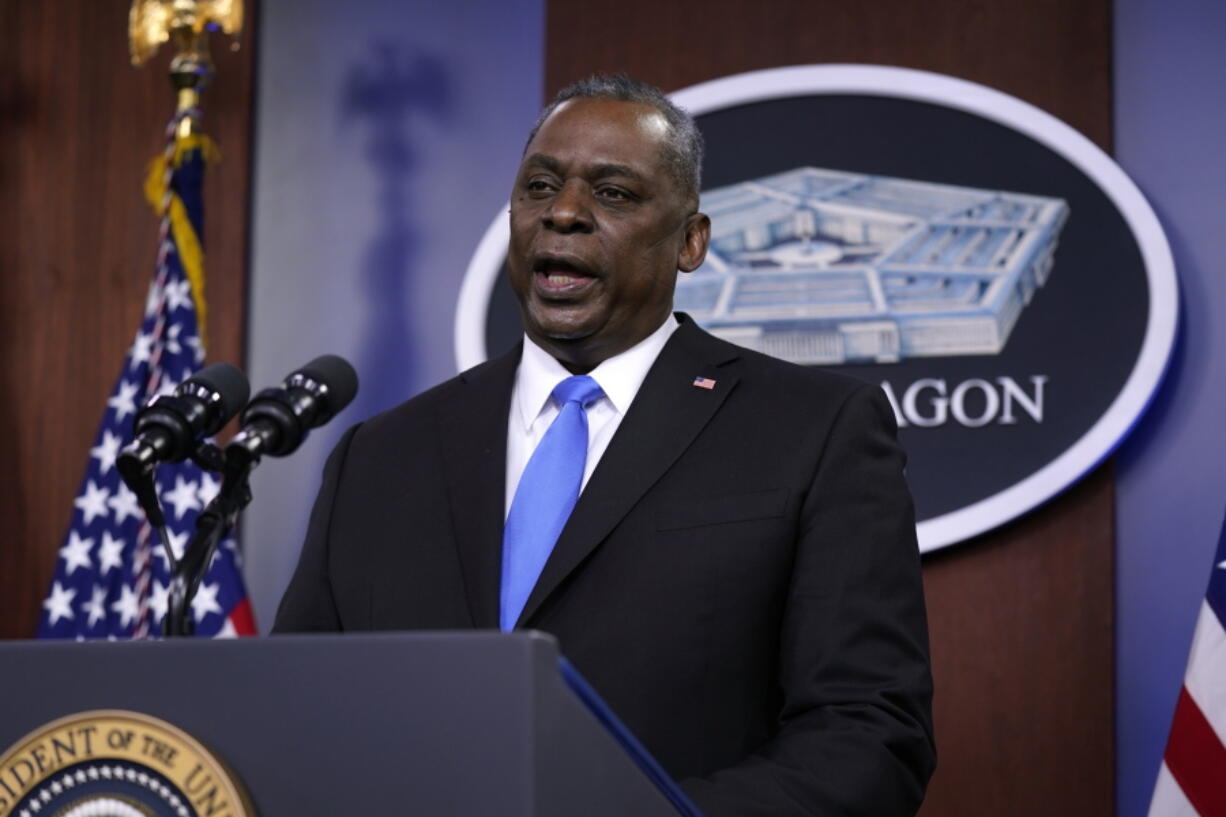 Defense Secretary Lloyd Austin speaks to Department of Defense personnel alongside President Joe Biden and Vice President Kamala Harris at the Pentagon, Wednesday, Feb. 10, 2021, in Washington.