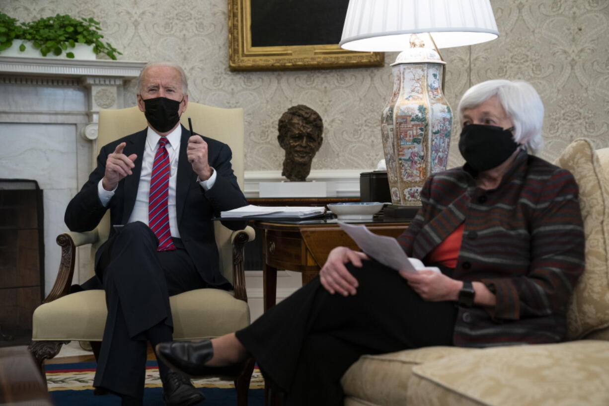 President Joe Biden meets with Treasury Secretary Janet Yellen in the Oval Office of the White House, Friday, Jan. 29, 2021, in Washington.