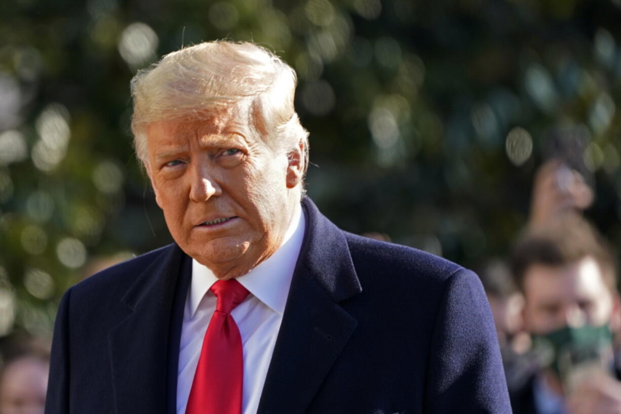 FILE - President Donald Trump walks to board Marine One on the South Lawn of the White House on Jan. 12, 2021, in Washington. Media critic Brian Stelter is updating his book &quot;Hoax: Donald Trump, Fox News and the Dangerous Distortion of Truth&quot; in preparation for the paperback edition. The changes reflect the end of Trump&#039;s presidency and the false claims of voter fraud and the rise of Tucker Carlson to become Fox&#039;s most prominent personality. Announced on Sunday, Feb, 21, 2021, the revised edition will be released in June.