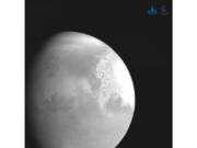 In this undated photo released by the China National Space Administration, a view of the planet Mars is captured by China&#039;s Tianwen-1 Mars probe from a distance of 2.2 million kilometers (1.37 million miles). A Chinese spacecraft appears poised to enter orbit around Mars on Wednesday, Feb. 10, 2021, one day after an orbiter from the United Arab Emirates did so, and about a week ahead of an American attempt to put down another spacecraft on the surface of the red planet.