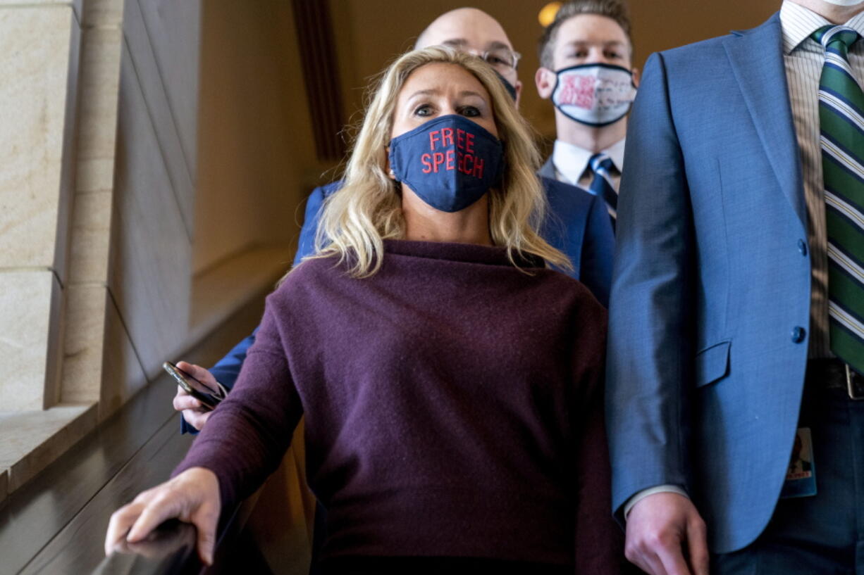 Rep. Marjorie Taylor Greene, R-Ga., goes back to her office after speaking on the floor of the House Chamber on Capitol Hill in Washington, Thursday, Feb. 4, 2021.