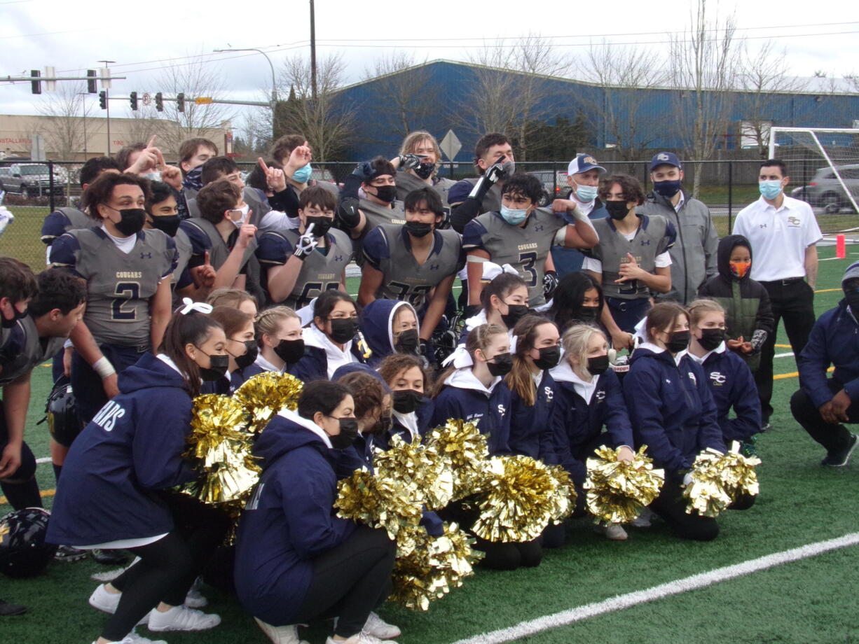 The Seton Catholic football team and cheerleaders celebrate the team's 28-26 overtime win over Columbia-White Salmon (Tim Martinez/The Columbian)