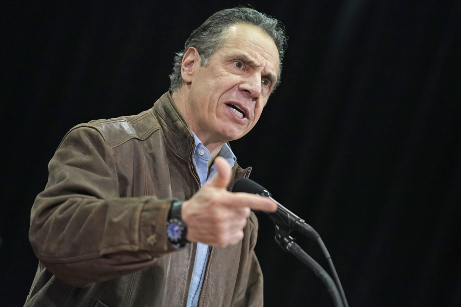 FILE - In this Wednesday, Feb. 24, 2021, file photo, New York Gov. Andrew Cuomo speaks during a press conference before the opening of a mass COVID-19 vaccination site in the Queens borough of New York.  A former aide&#039;s allegations that Gov. Cuomo subjected her to an unwanted kiss during years of sexual harassment have spurred calls for an investigation -- and questions about who might meaningfully conduct one.