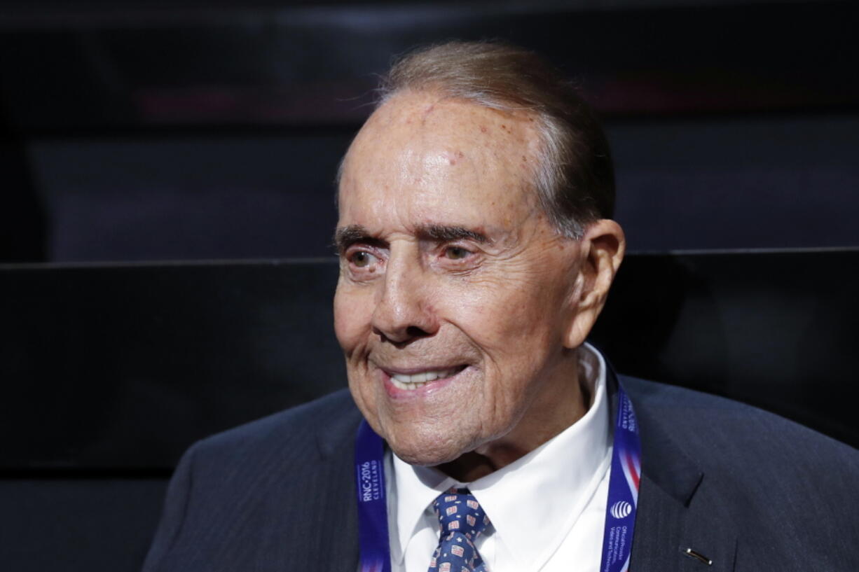 FILE - In this July 18, 2016 file photo, political icon and 1996 Republican presidential nominee Sen. Bob Dole is seen at the Republican National Convention in Cleveland.  Dole says he has been diagnosed with stage 4 lung cancer. The 97-year-old former U.S. Senate majority leader said Thursday in a short statement that he would begin treatment for the disease Monday.