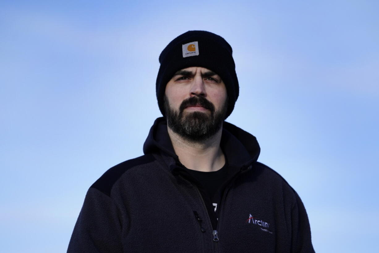 Stuart Hill, a United Auto Workers member who works at the General Motors Toledo Transmission Operations facility, poses in Toledo, Ohio, Tuesday, Feb. 2, 2021.   At 38 years old and a GM employee for five years, Hill is still decades from retirement. He wonders about the future of that plant and his role in it.  &quot;It&#039;s something that&#039;s in the back of my mind,&quot; Hill said.