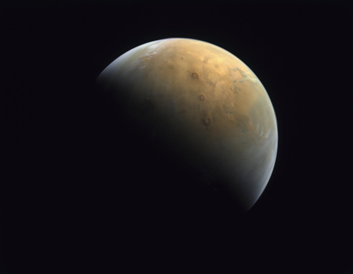 This Feb. 10, 2021 image taken by the United Arab Emirates&#039; &quot;Amal,&quot; or &quot;Hope,&quot; probe was released Sunday, Feb. 14, 2021, shows Mars . The Hope space probe now circles the red planet.