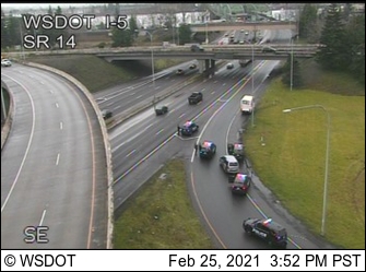 Vancouver police investigate an apparently stolen delivery truck on the onramp to Interstate 5 on Thursday afternoon.