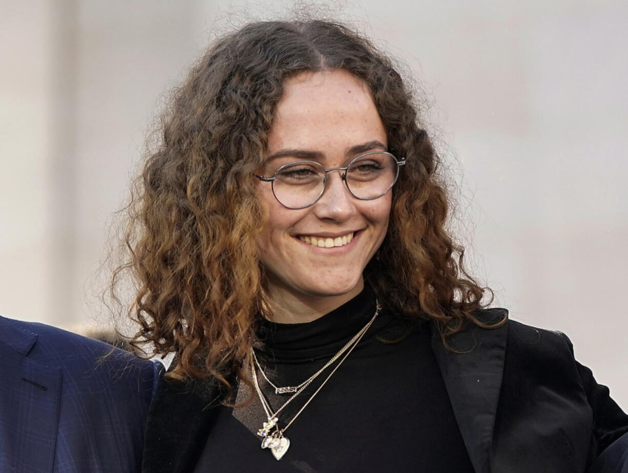 FILE -Ella Emhoff appears at a rally for her stepmother Sen. Kamala Harris, announcing Harris&#039; presidential campaign in Oakland, Calif., Sunday, Jan. 27, 2019. The designers at Proenza Schouler dressed Ella Emhoff in a couple of coats (plus a pantsuit) for her modeling debut in their new collection, unveiled Thursday for New York Fashion Week. Designers Lazaro Hernandez and Jack McCollough said the fashion world took quick notice when 21-year-old Emhoff appeared at the inauguration in January, dressed in a quirky Miu Miu coat with bejeweled shoulders along with a starchy white collar.