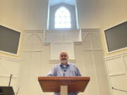 FILE - In this Thursday, Feb. 18, 2021 file photo, Pastor Jim Conrad stands in the Towne View Baptist Church in Kennesaw, Ga. In its 2021 meeting, the Southern Baptist Convention&#039;s executive committee voted to oust the church for allowing LGBTQ people to become members of its congregation.