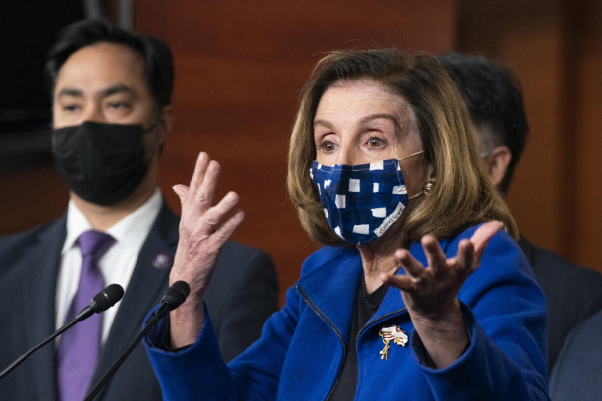 House Speaker Nancy Pelosi of Calif., with impeachment manager Rep. Joaquin Castro, D-Texas, left, speaks to members of the media during a news conference on Capitol Hill in Washington, after the U.S. Senate voted not guilty, to acquit former President Donald Trump of inciting riot at U.S. Capitol, ending impeachment trial, Saturday, Feb. 13, 2021.