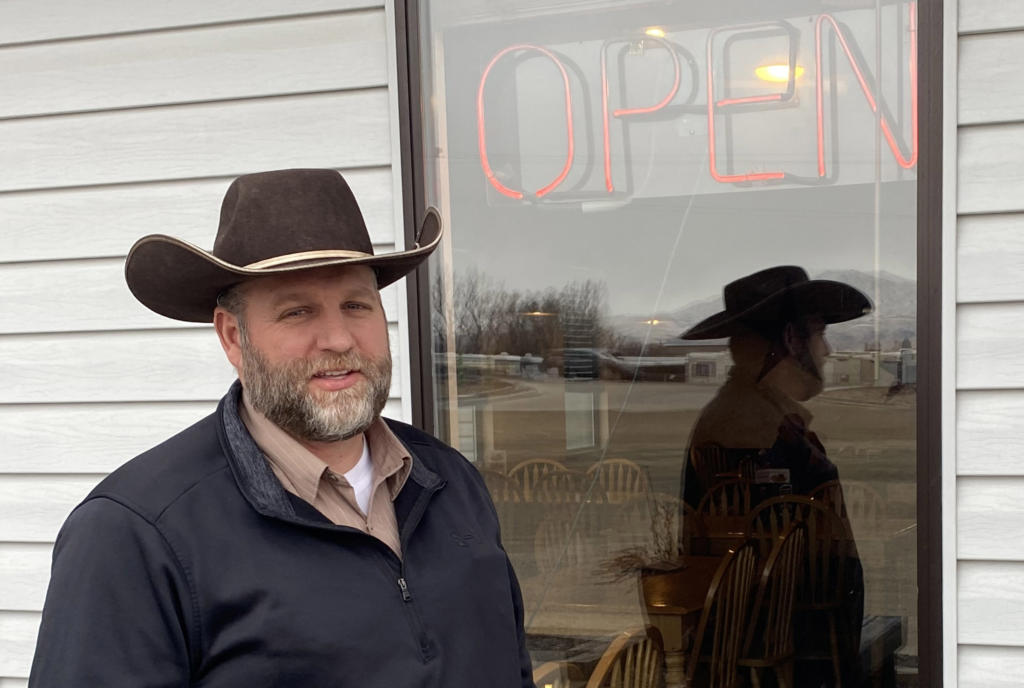 Ammon Bundy, who led the armed occupation of the Malheur National Wildlife Refuge in 2016, stands in front of a restaurant Jan. 27, 2021, in Emmett, Idaho.