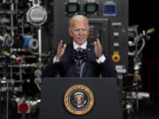 FILE - In this Feb. 19, 2021, file photo President Joe Biden speaks after a tour of a Pfizer manufacturing site in Portage, Mich.