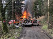 Crews from Clark-Cowlitz Fire Rescue faced a challenge Monday when a house down a steep, muddy road near the Lewis River caught fire. The home ended up being a total loss.