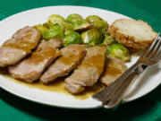 Whiskey Mustard-Crusted Pork with Balsamic Glazed Brussels Sprouts.