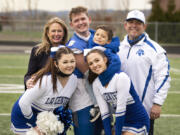 The Lambert family poses for a picture following a football game at Woodland High School. Pictured in back row, from left, are Kerry, Tom, Scotty and John. In front are Lynda and Mary. The Lambert family has always revolved around La Center football, where John has coached for 22 years.