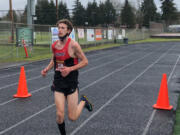 Camas junior Evan Jenkins crosses the finish line at the 4A Greater St. Helens League cross country meet on Wednesday at Battle Ground High School. It was likely the final high school cross country race here for Jenkins, who plans to move with his family to Israel for his senior year.